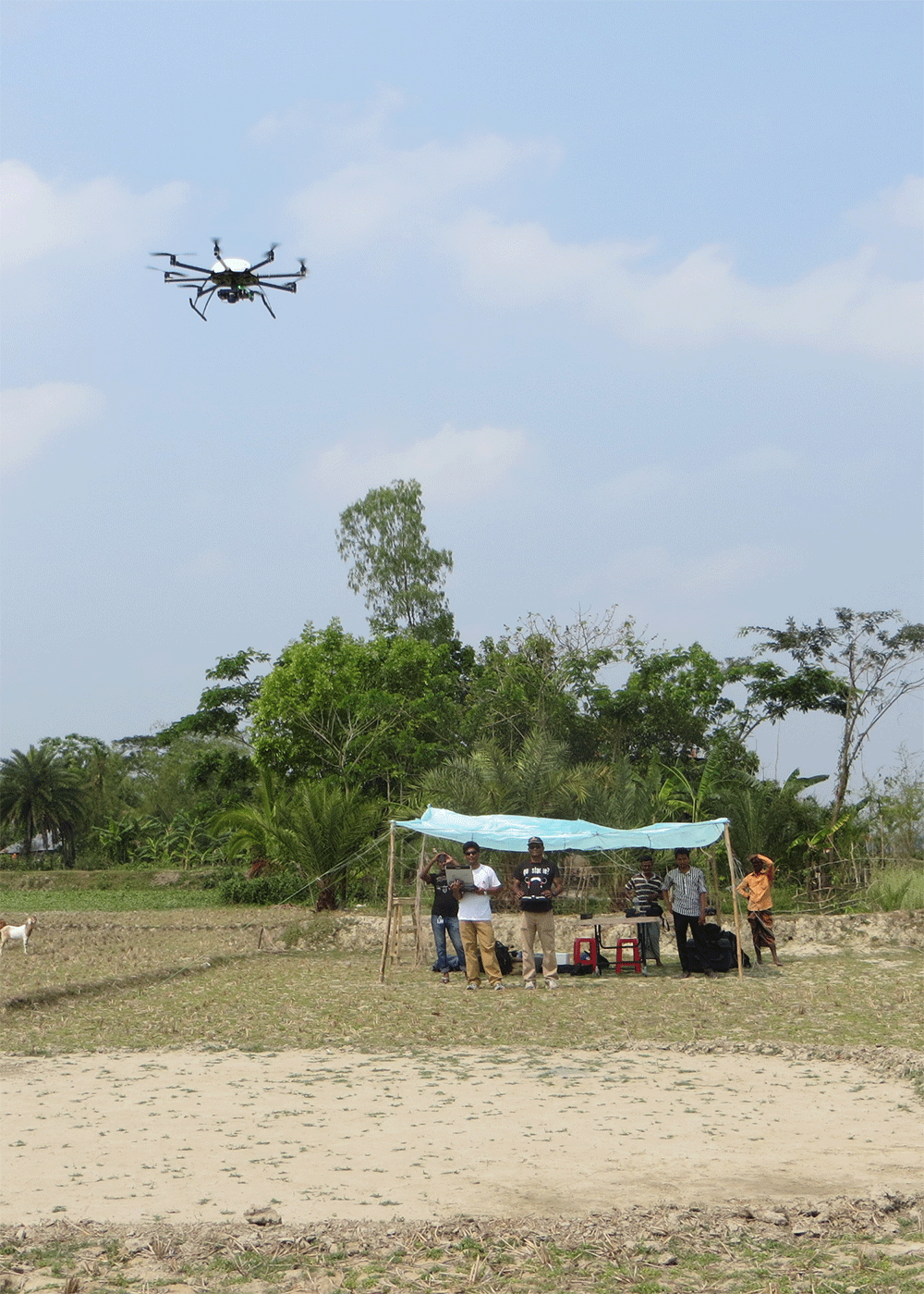 STARS researchers flying the octocopter in Barisal, Bangladesh
